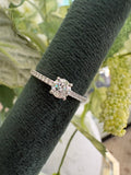 Platinum diamond solitaire ring with diamond shoulders