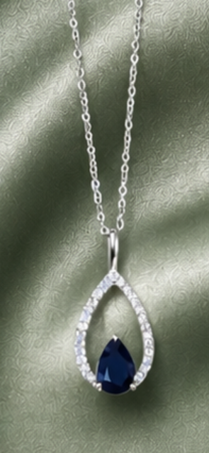 9ct White gold chain with white gold pear shaped diamond and sapphire pendant