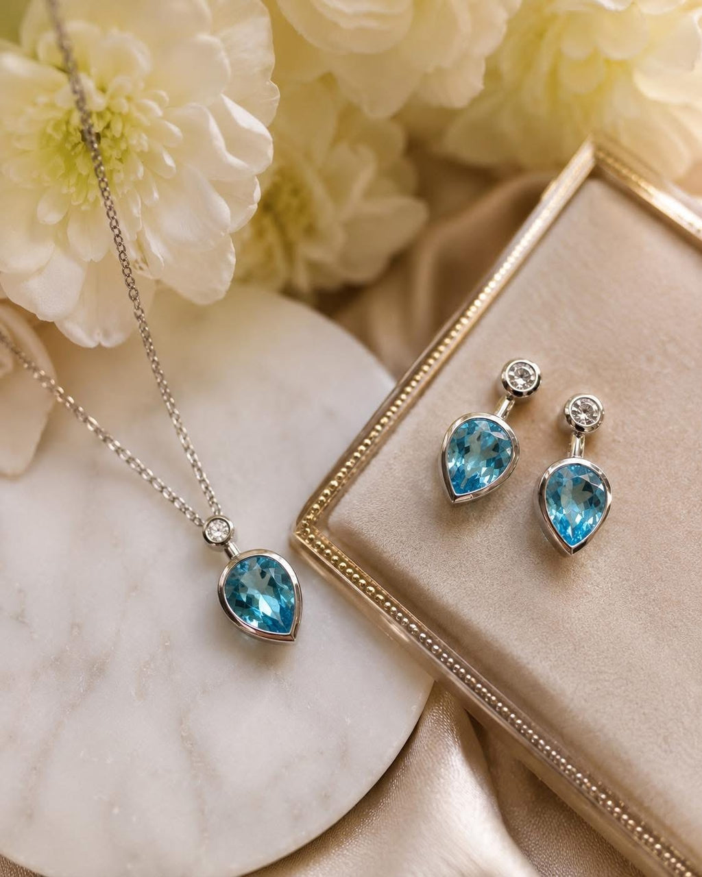 9ct White Gold Blue Topaz and Diamond Drop Earrings