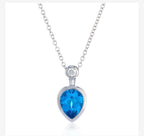9ct White Gold Blue Topaz and Diamond Pendant and Chain