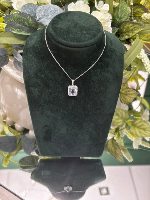 18ct White Gold Rectangle Blue Topaz with Halo Diamond Cluster Surround