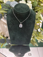 18ct White Gold Rectangle Blue Topaz with Halo Diamond Cluster Surround
