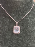 18ct White Gold Rectangle Blue Topaz with Halo Diamond Cluster Surround