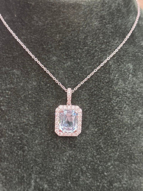 18ct White Gold Rectangle Blue Topaz with Halo Diamond Cluster Surround
