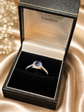 PLATINUM CEYLON SAPPHIRE AND DIAMOND HALO CLUSTER RING
