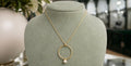 Lido Pearls - Gold plated chain with large open ring with freshwater button pearl